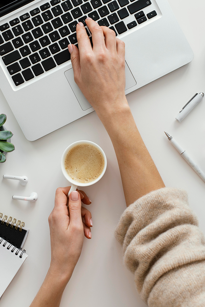 woman-taking-notes-her-laptop